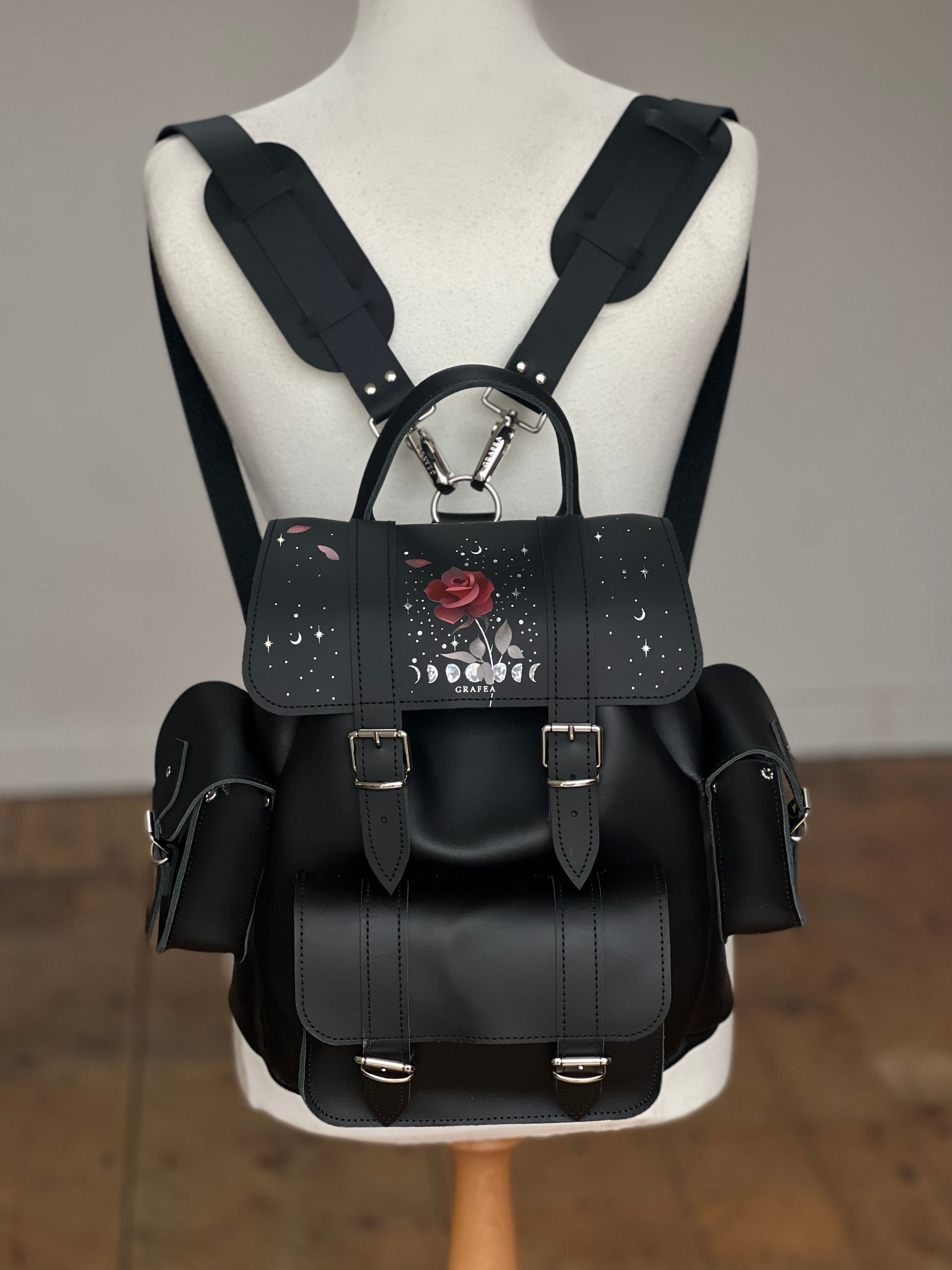 black herondon sling leather backpack børn HARI II IRIDESCENT ROSE MOON Made from Italian nylon JanSport Backpack Red Black filter::size:125 Color:Cured Hide (8 Pack)