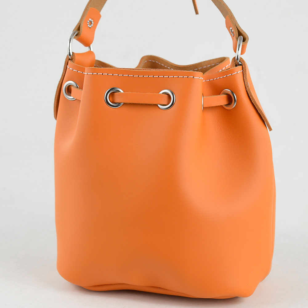carrot mini crossbody backpack MINI BUCKET CARROT CAKE